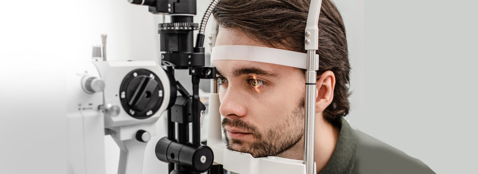 young man during eye exam in Beachwood